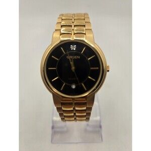 NWOT Gruen 33mm Gold Tone Black Ladies' Watch. 6.75".